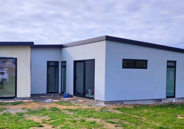 Modern home in Tasman with clean exterior plaster finish by Get Plastered Nelson.