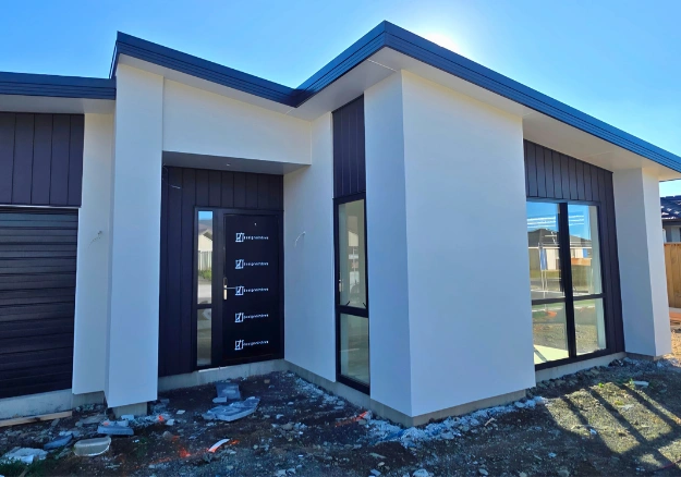 Completed exterior plastering project on a residential home in Nelson.