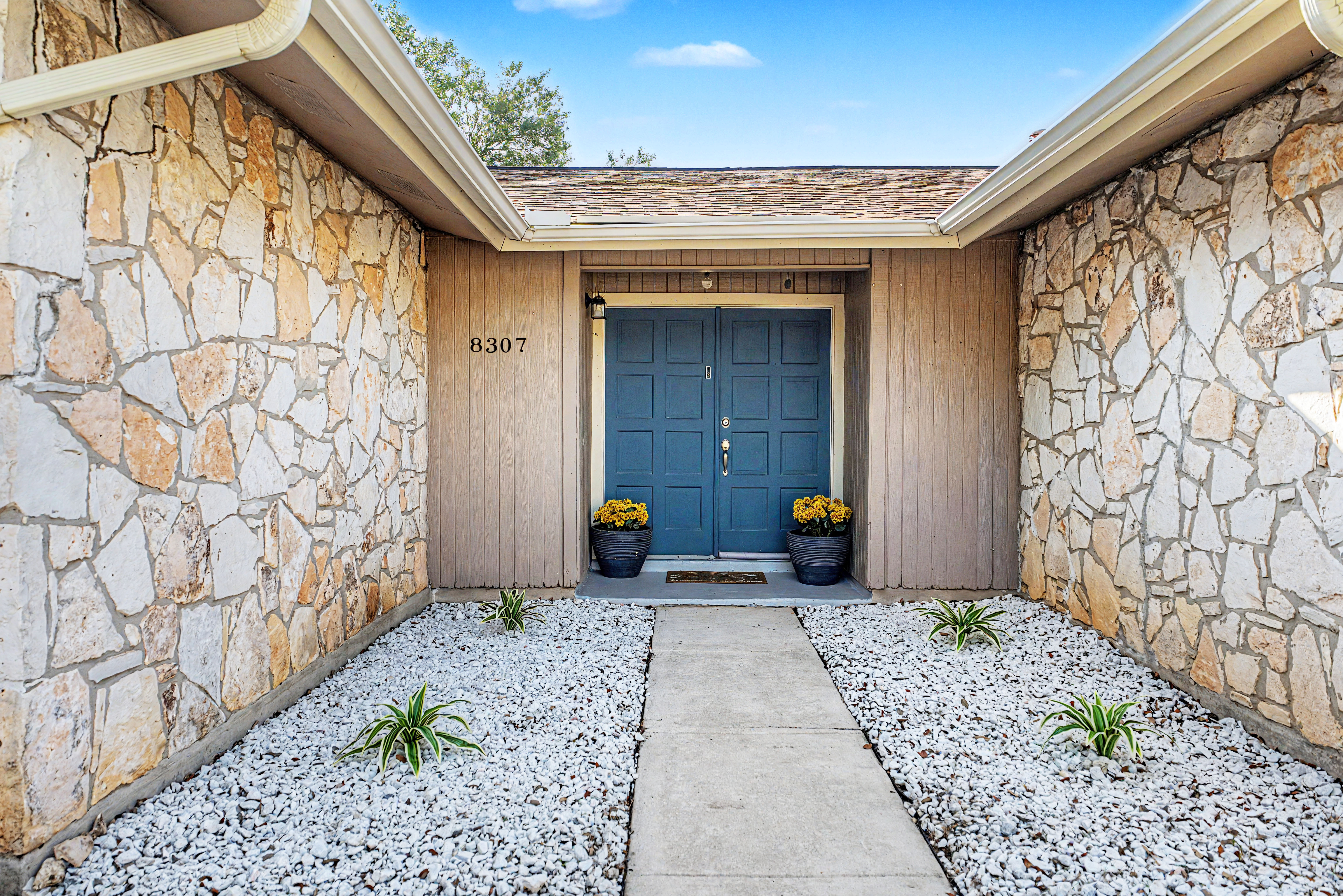 Residential property exterior photographed for a listing