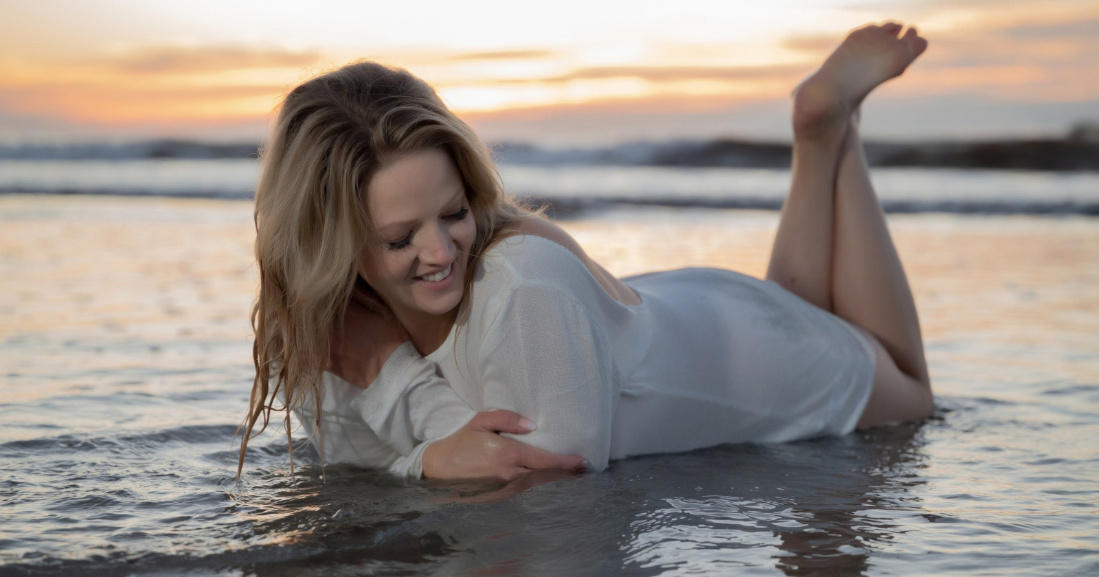 Amanda Marquis beach portrait, wind in hair, natural movement