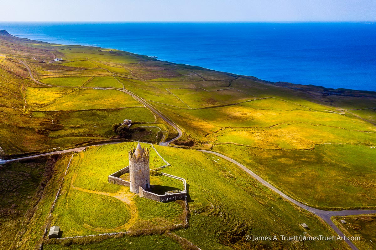 Doonagore Castle on the Atlantic Ocean coast of County Clare, Ireland.
