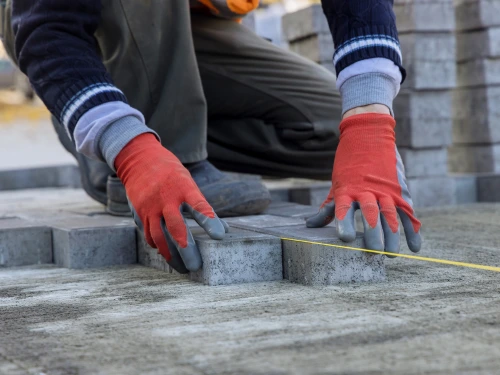 Laying stone in Highland Acres