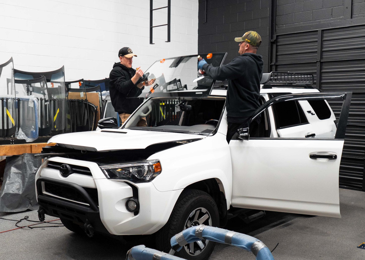 Auto glass technician at work