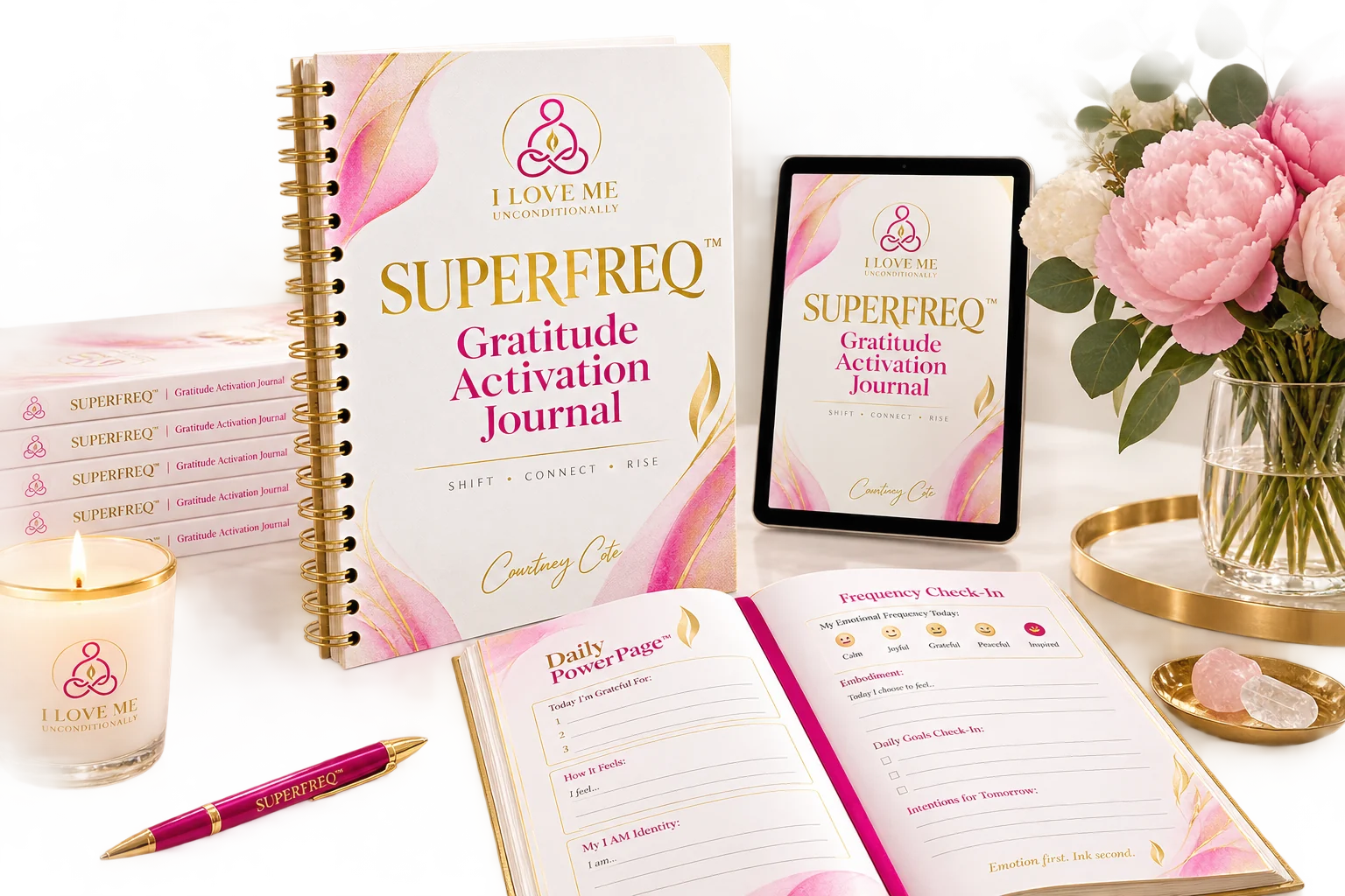 SUPERFREQ Gratitude Activation Journal by Courtney Cote — spiral-bound journal with pink and gold cover, shown open to the Daily PowerPage and Frequency Check-In spread