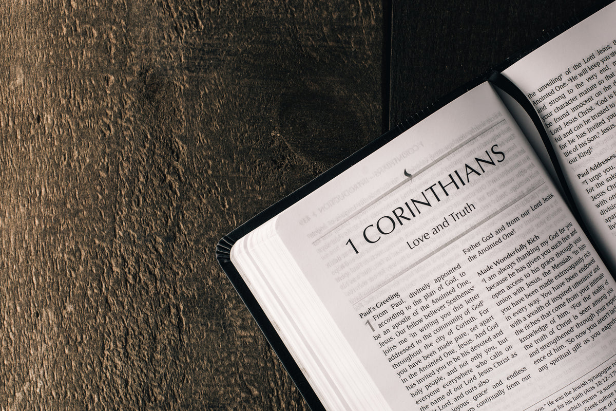 An open Bible at First Corinthians, Love and Truth