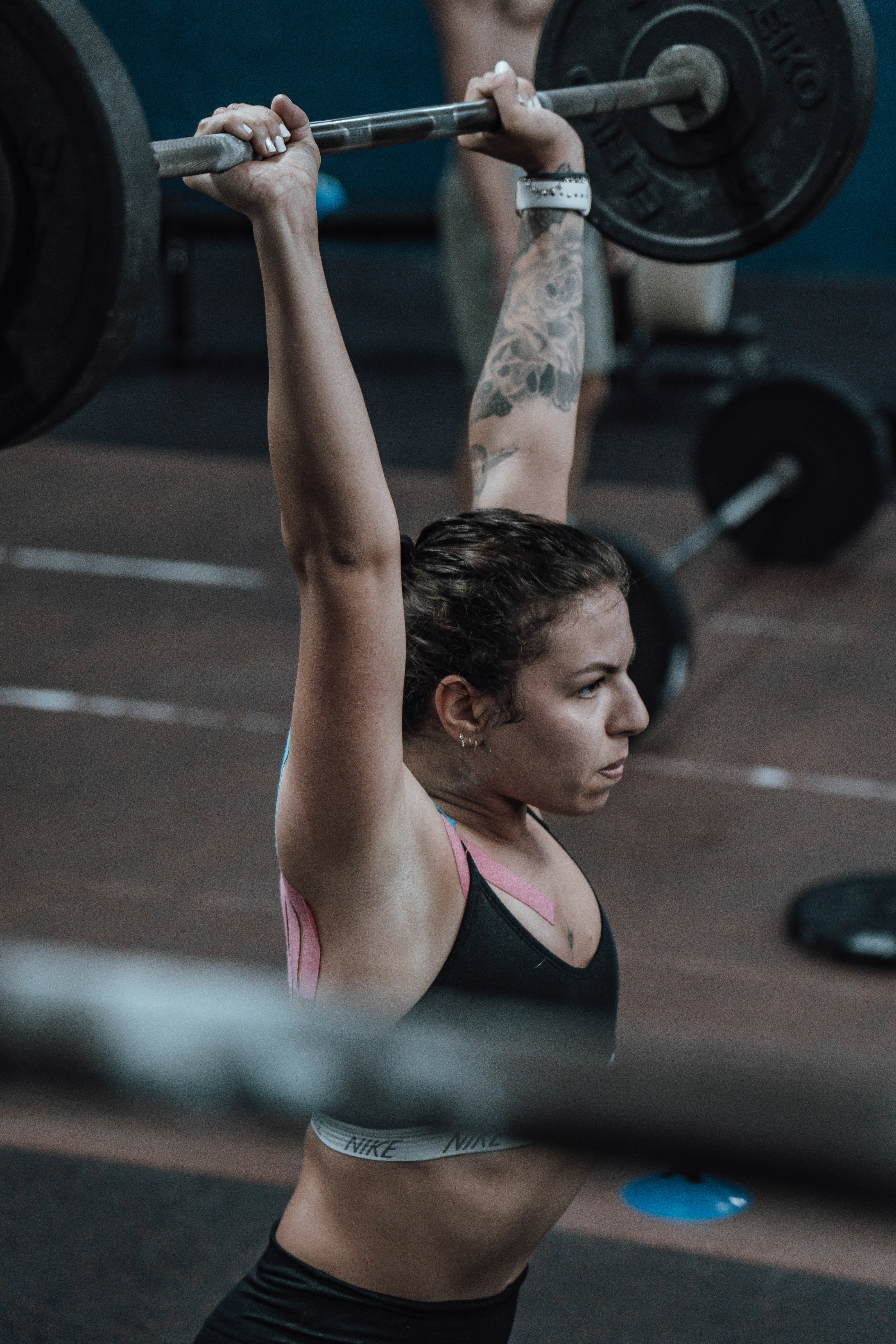 woman lifting heavy weight woman lifting heavy weight