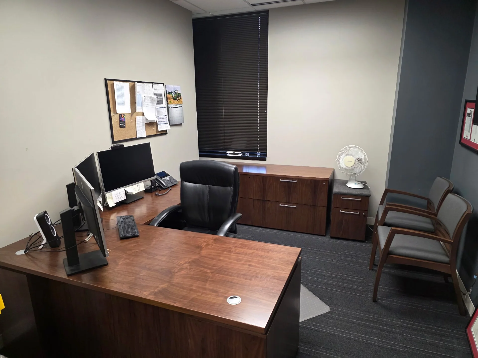 private office workspace with desk chair computer and furniture ready for removal or relocation
