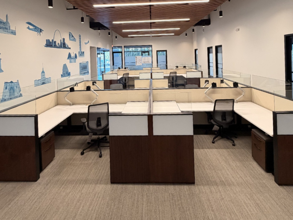modern office cubicle installation with workstations and desks set up by commercial moving and furniture installation team