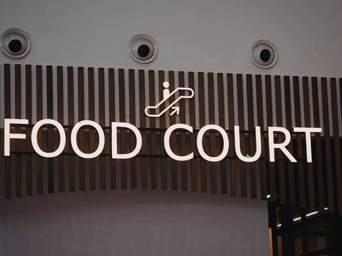 commercial signage installation food court sign interior retail space modern wall mounted lettering