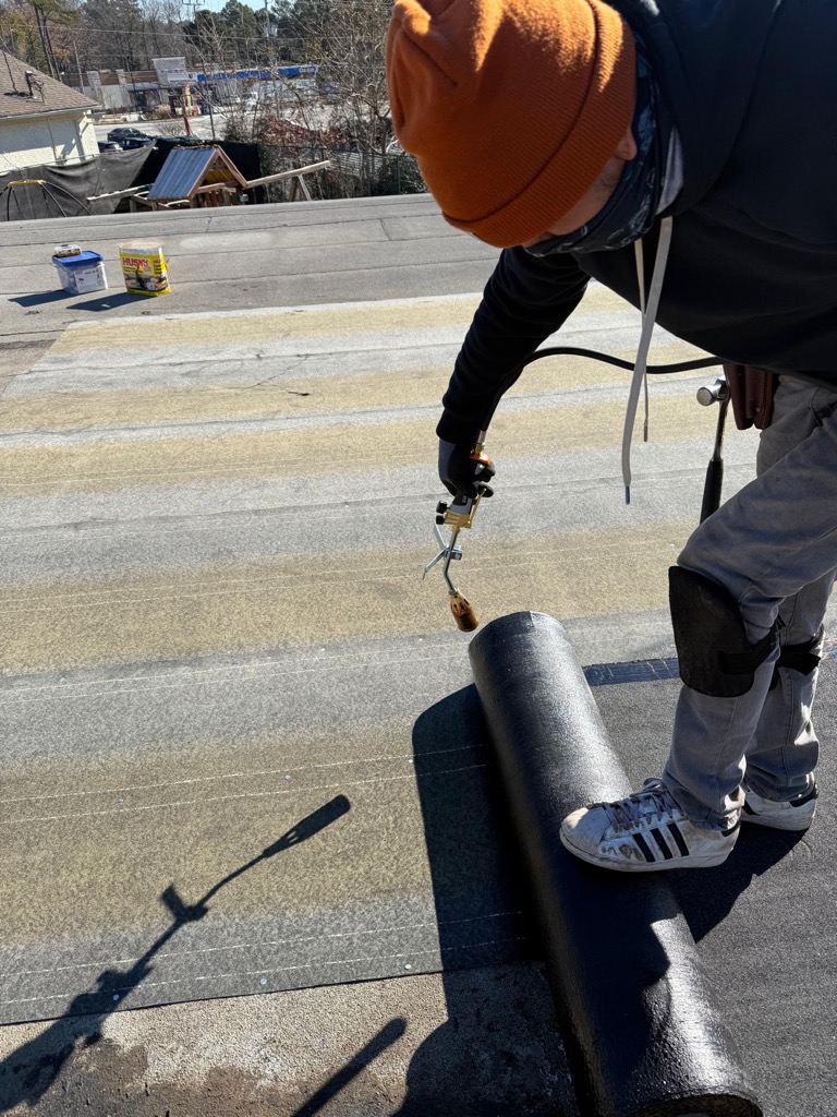 Storm damage repair in Atlanta, GA Torch down flat roof repair Atlanta GA - Rooftops Unlimited