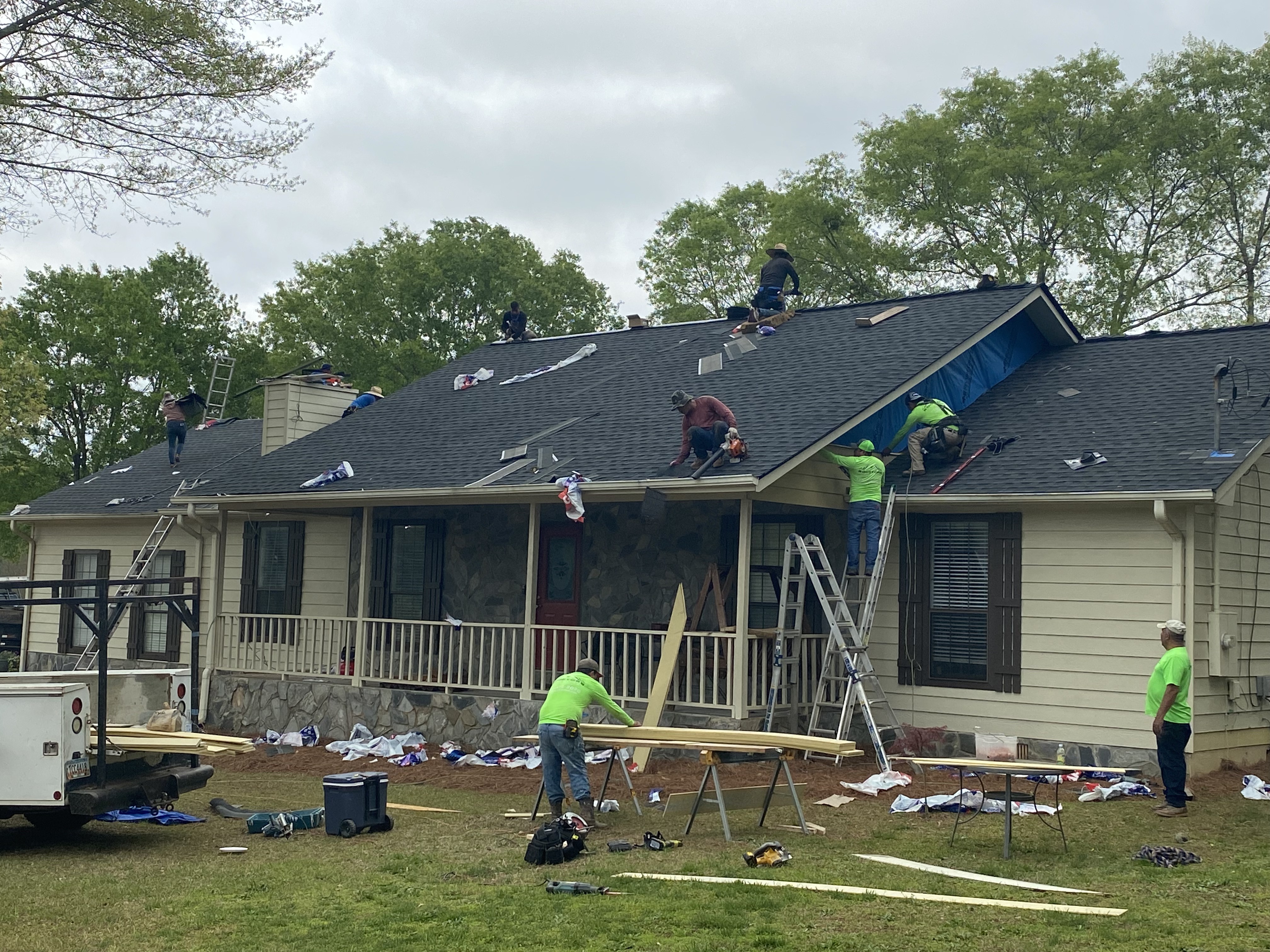 Commercial & Multi-Family Exteriors Commercial flat roof and multi-family exterior installation across the Atlanta metropolitan area