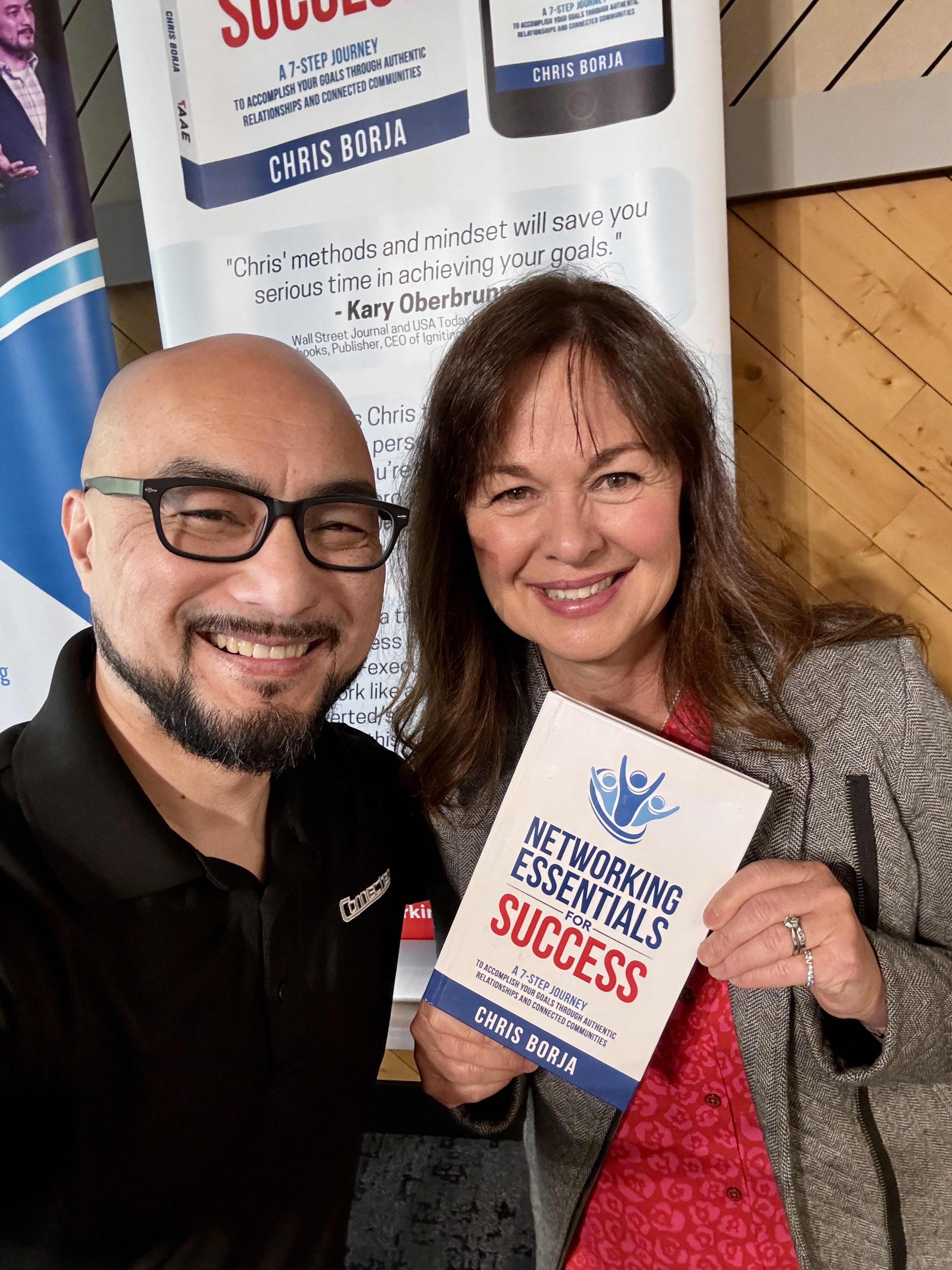 Chris Borja with a reader of Networking Essentials for Success