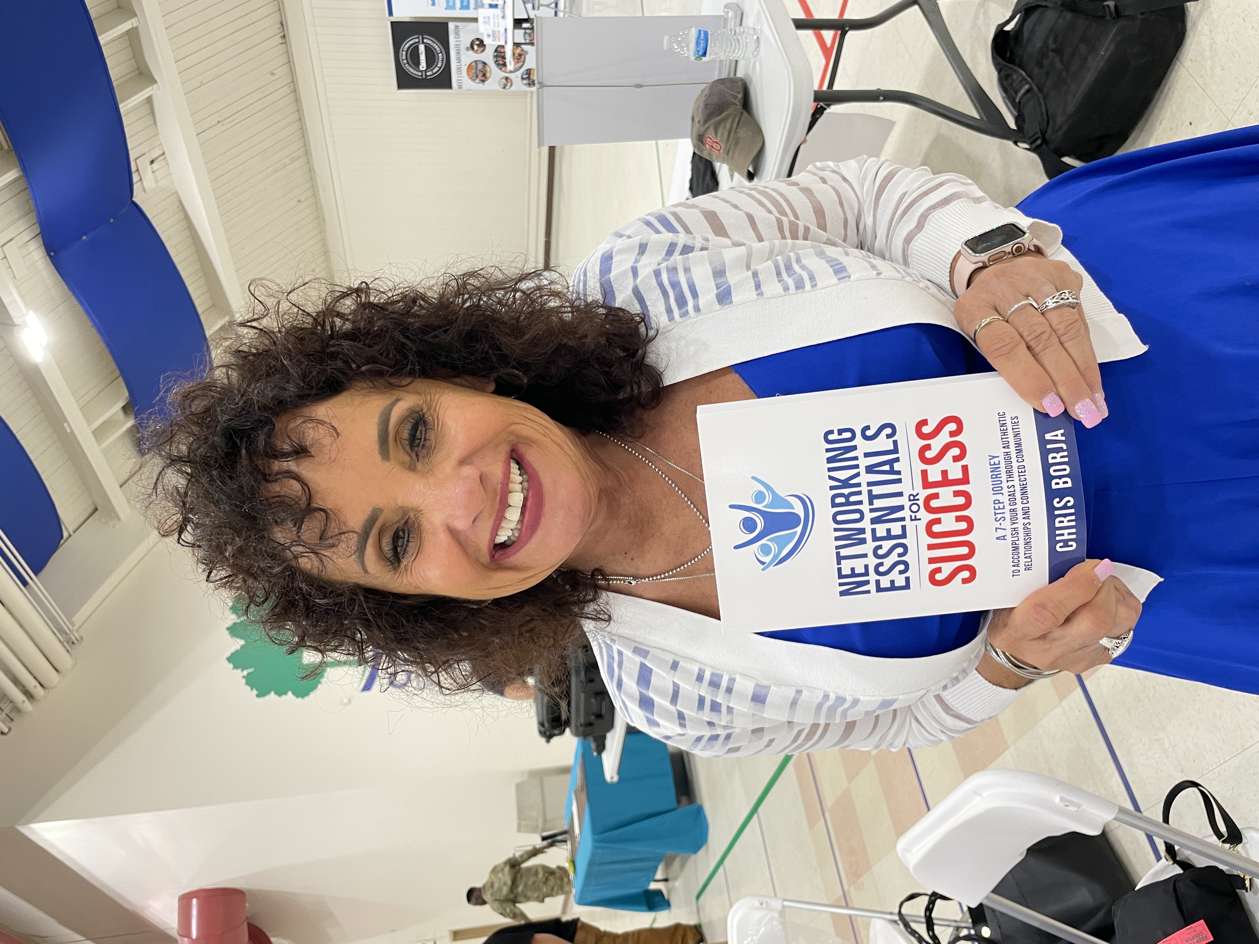 Chris Borja with a reader of Networking Essentials for Success