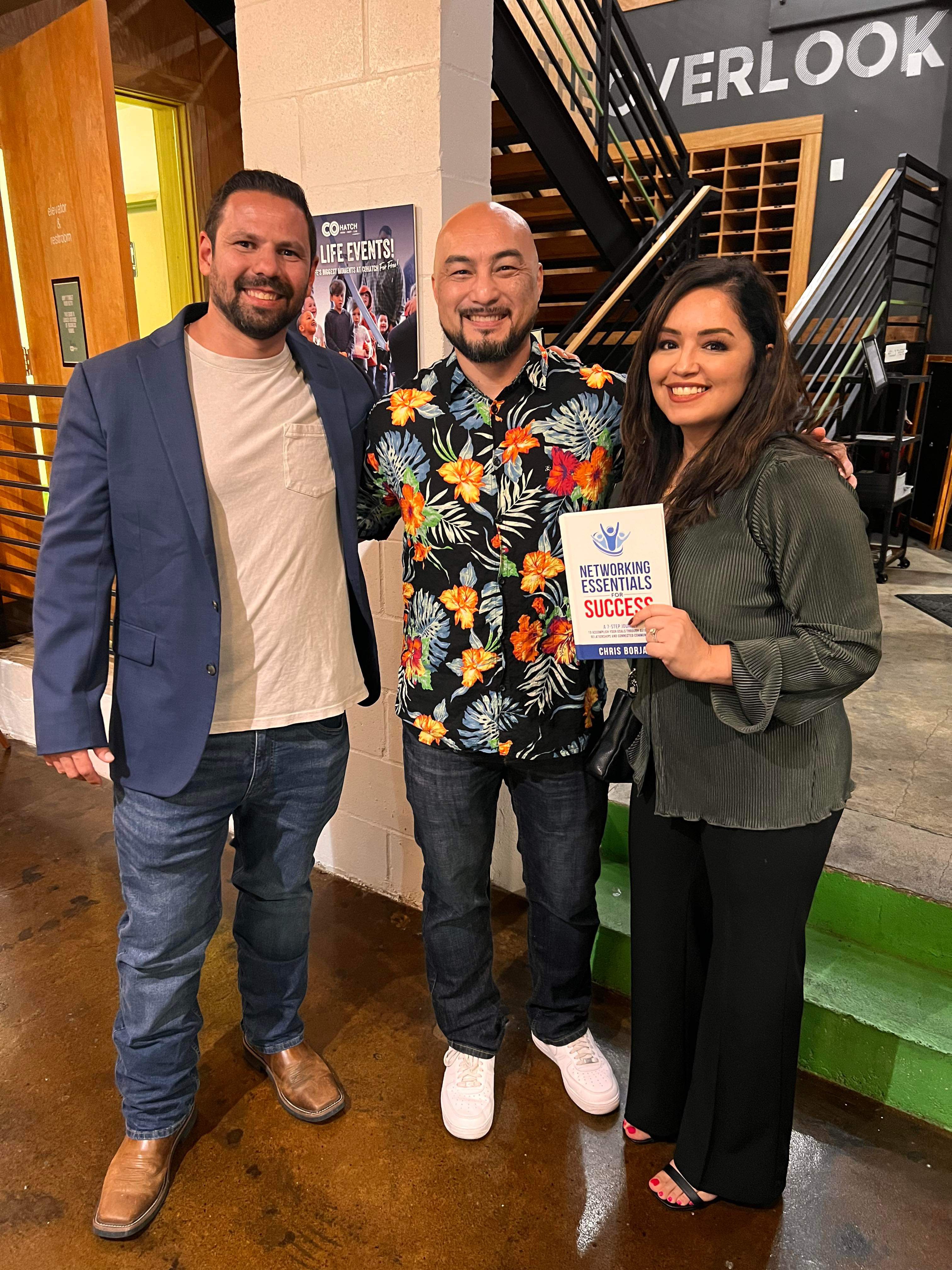 Chris Borja with a reader of Networking Essentials for Success