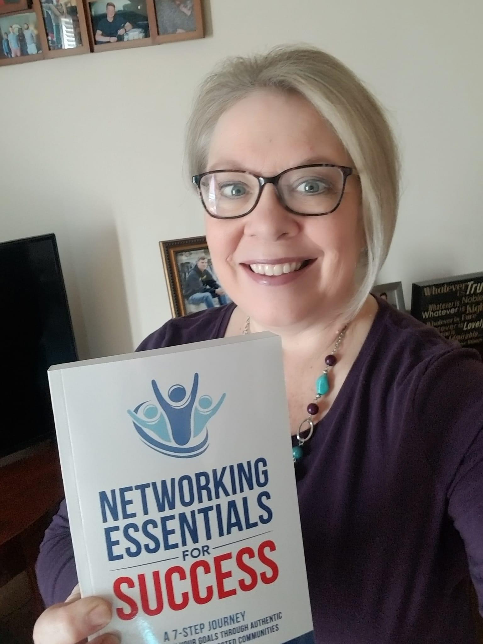 Chris Borja with a reader of Networking Essentials for Success