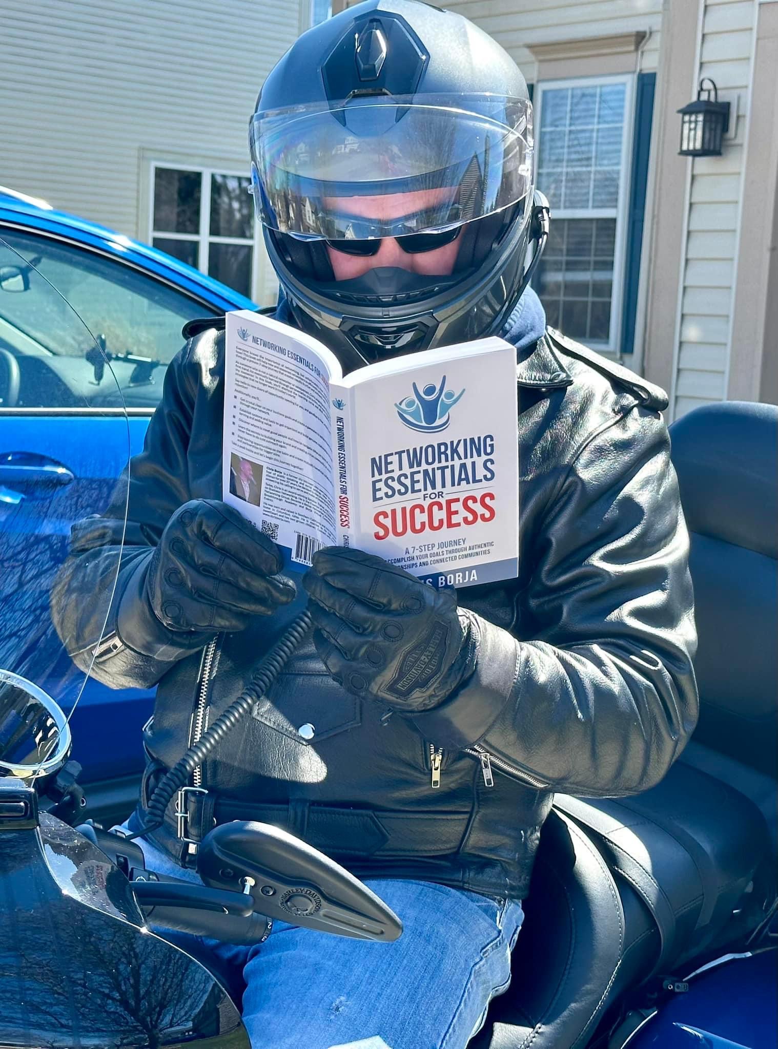 Chris Borja with a reader of Networking Essentials for Success