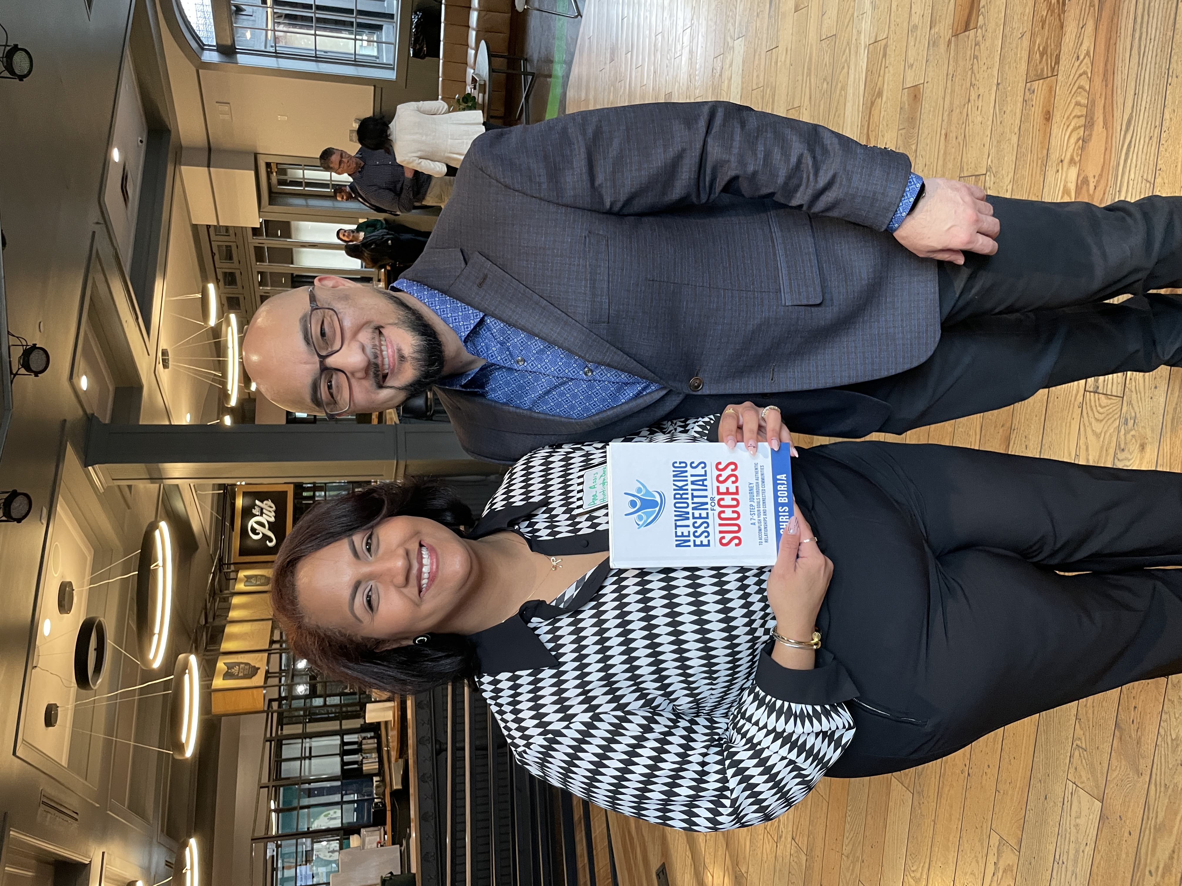 Chris Borja with a reader of Networking Essentials for Success