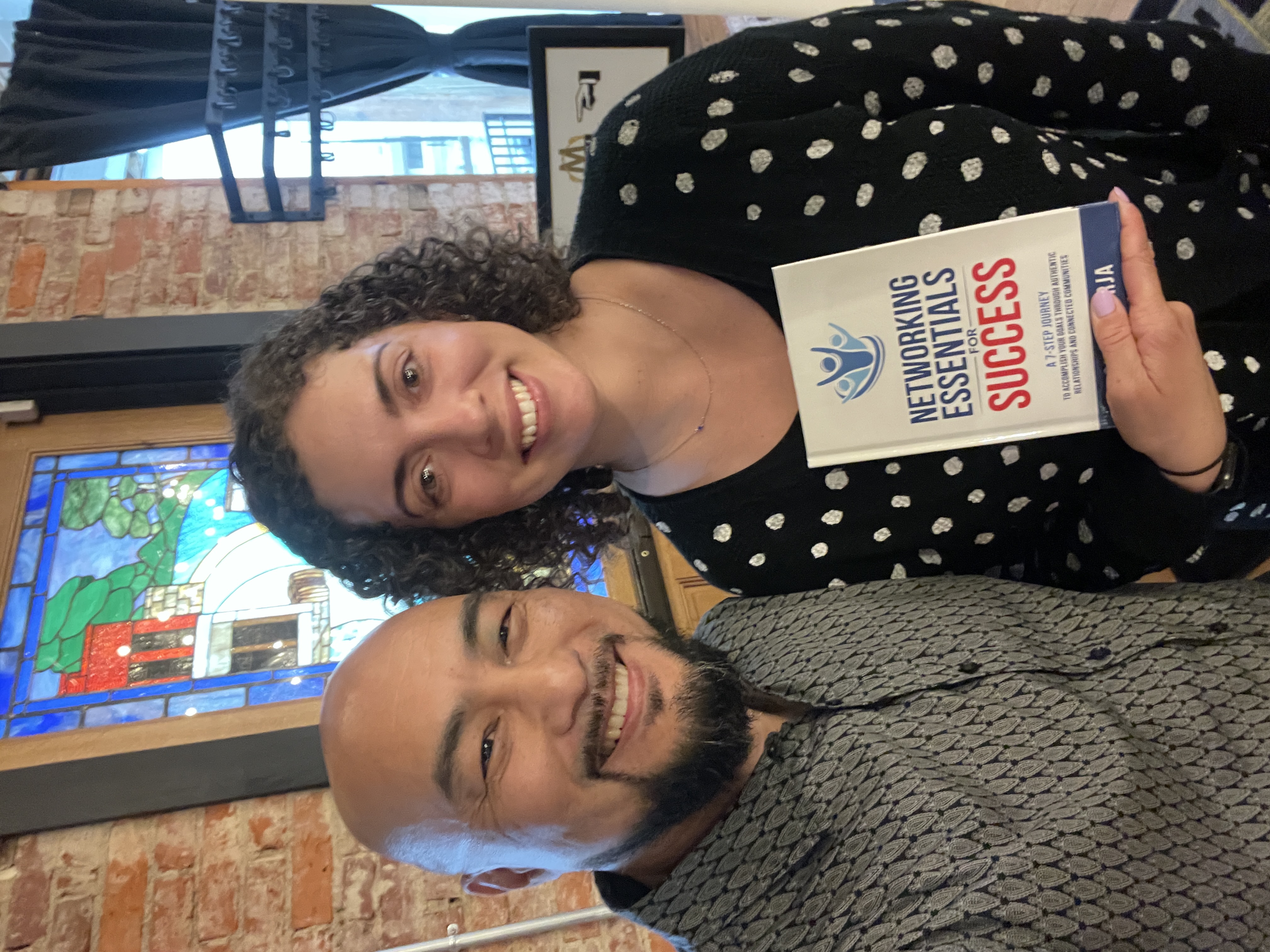 Chris Borja with a reader of Networking Essentials for Success