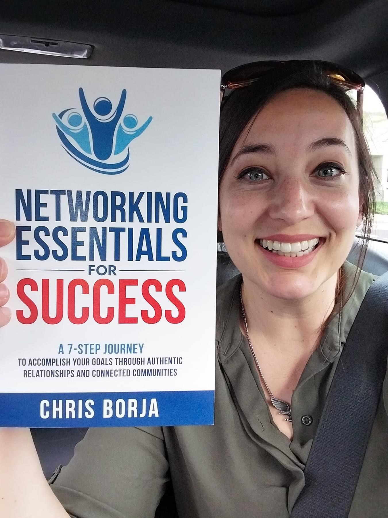 Chris Borja with a reader of Networking Essentials for Success