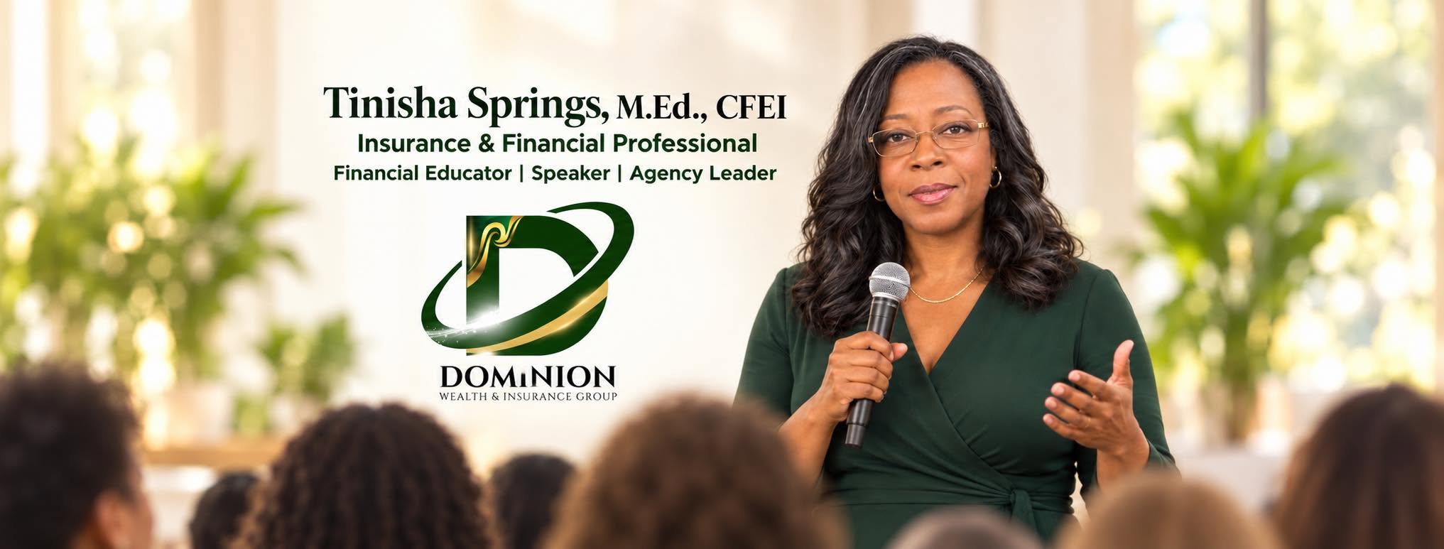 Tinisha Springs speaking banner with Dominion Wealth and Insurance Group branding and an audience