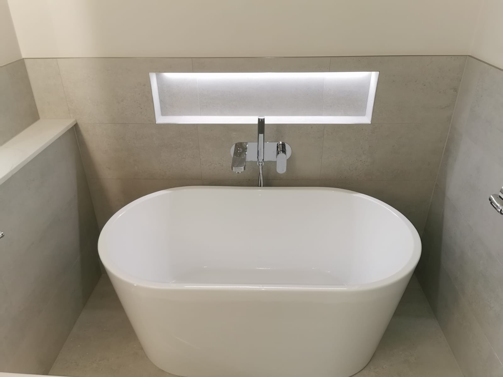 Bathroom with a freestanding bath