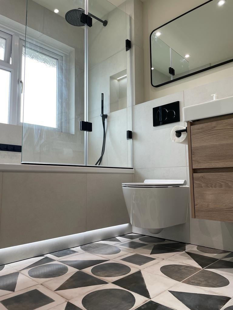 Monochrome renovated interior with crisp modern finishes