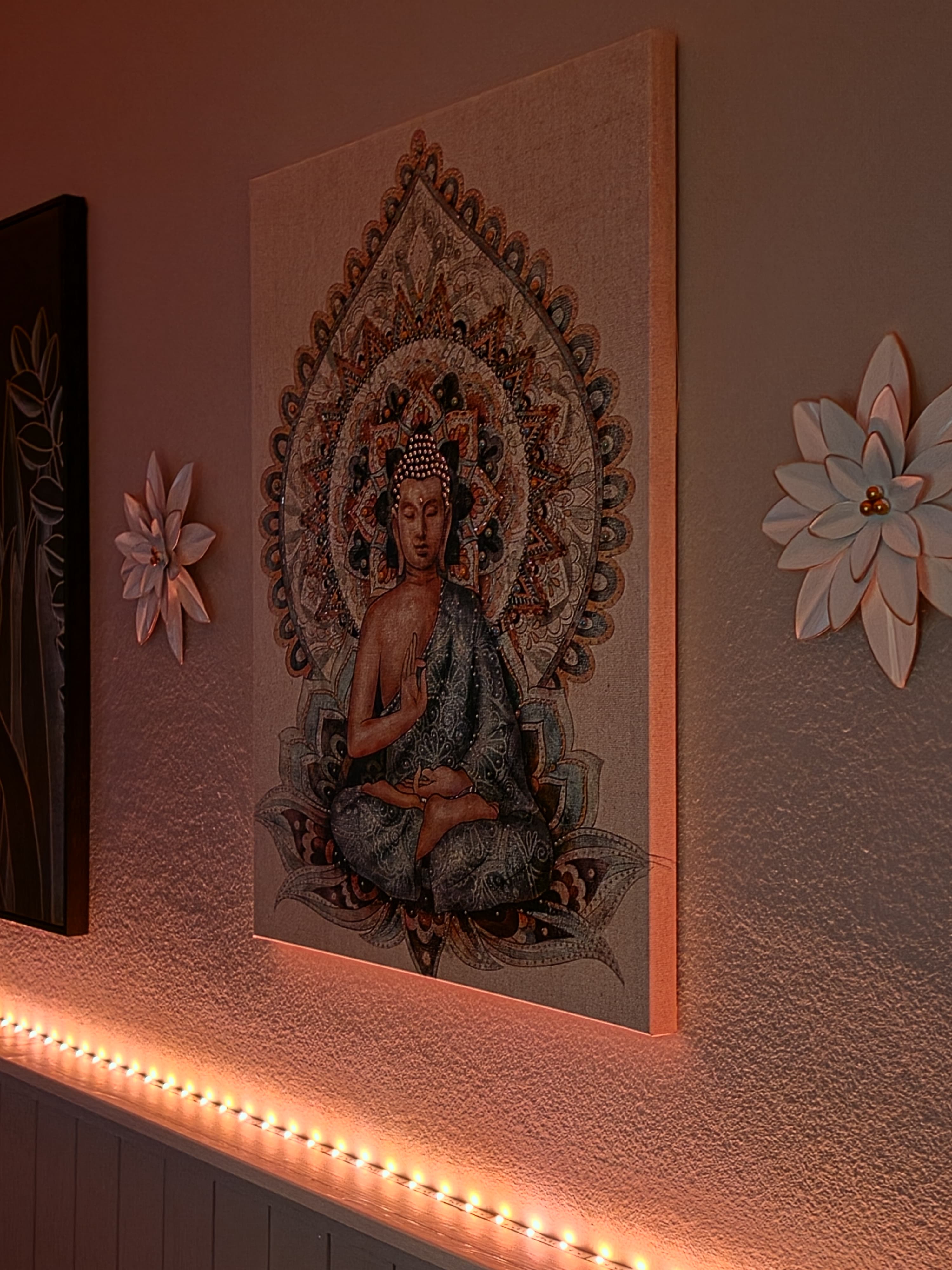 Buddha canvas lit by warm LED