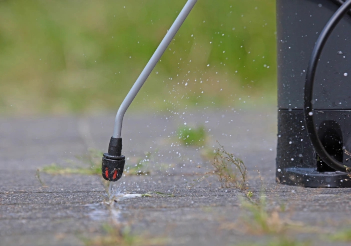 WNTRGRN Lawn and Snow providing residential and commercial weed control in Hennepin County