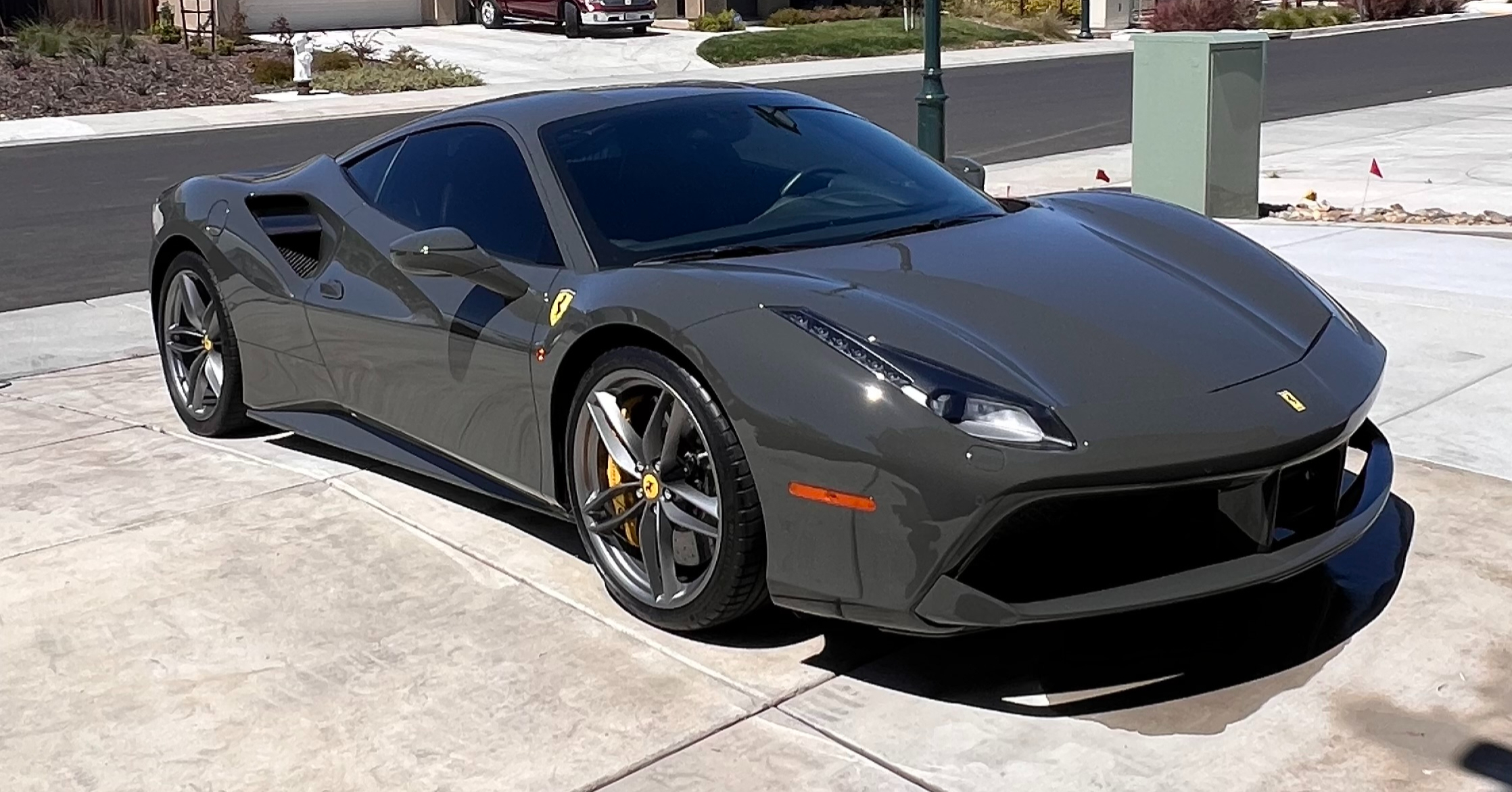 Professional ceramic coating application on luxury vehicle