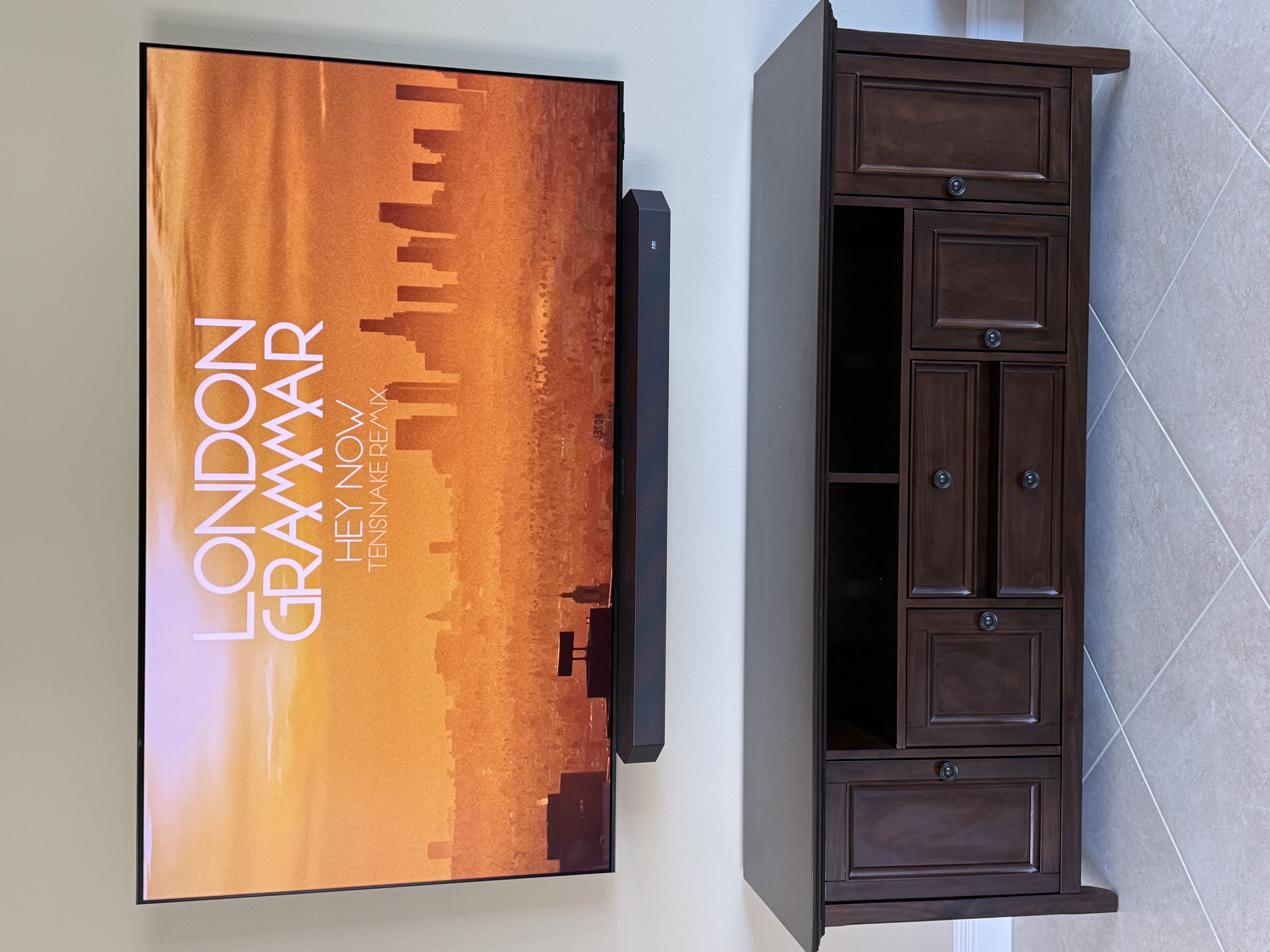 Mounted soundbar with speaker wires concealed inside the wall for a seamless finish