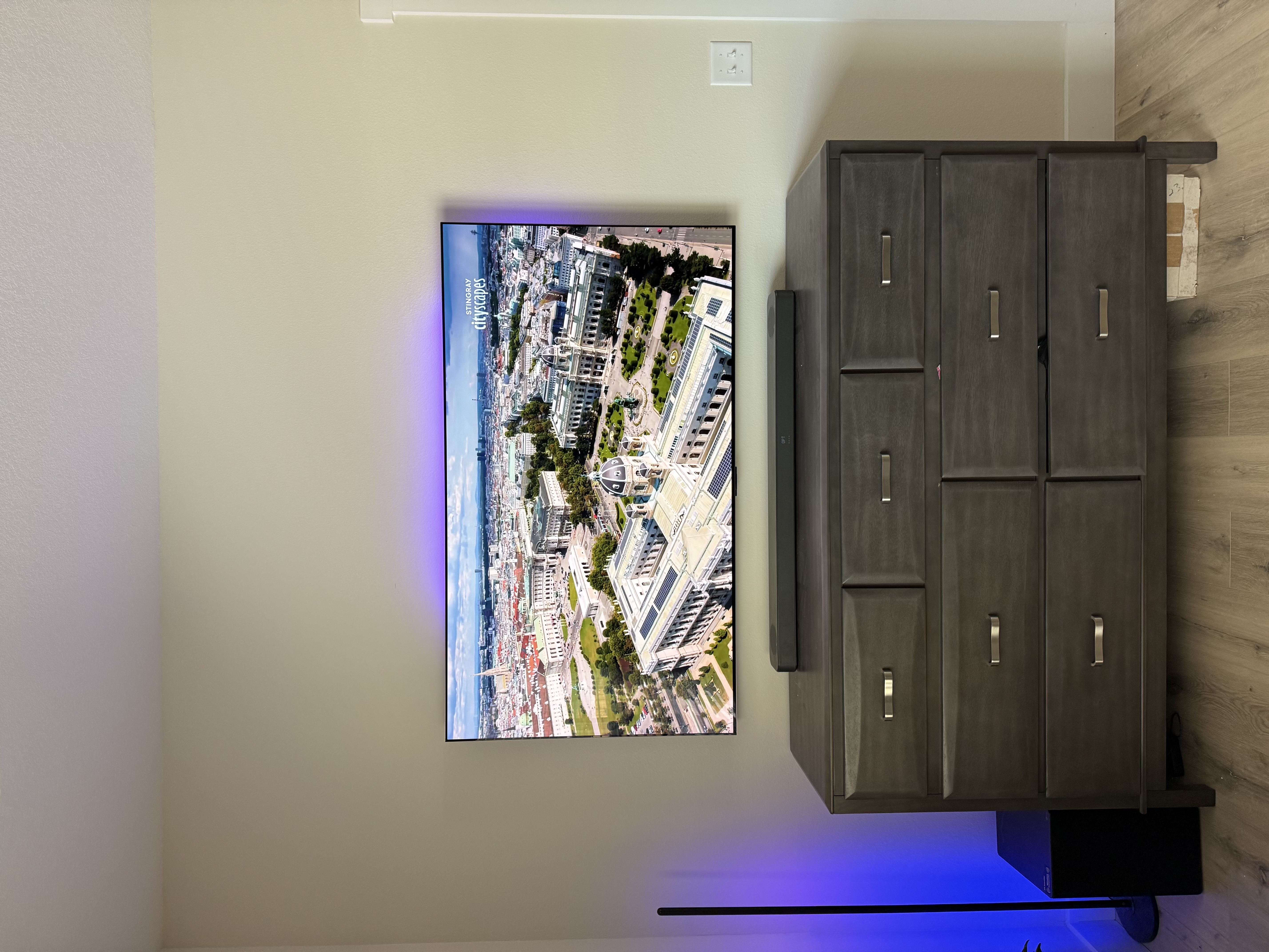 TV mounting service in Bradenton, Florida featuring a TV mounted on a concrete accent wall in an office
