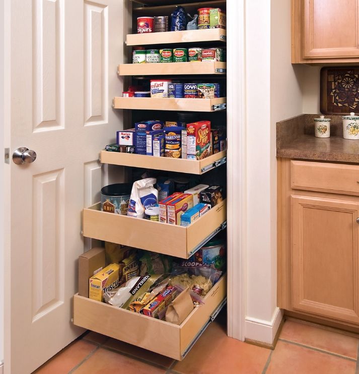 Full-extension pull-out shelf loaded with kitchen items, by Myk's Woodworking