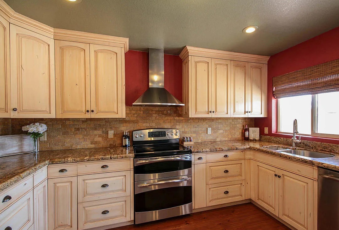 Glazed alder kitchen island and cabinetry, foothills by Myk's Woodworking