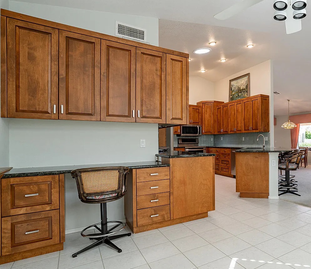 Custom raised-panel storage and joinery, SaddleBrooke by Myk's Woodworking