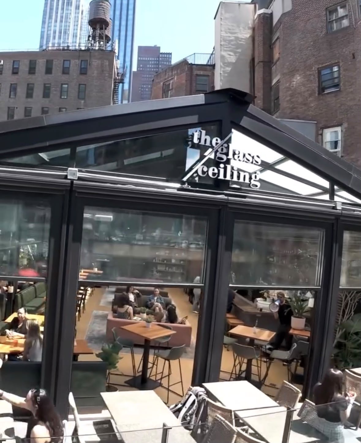Commercial glass roof enclosure at rooftop venue