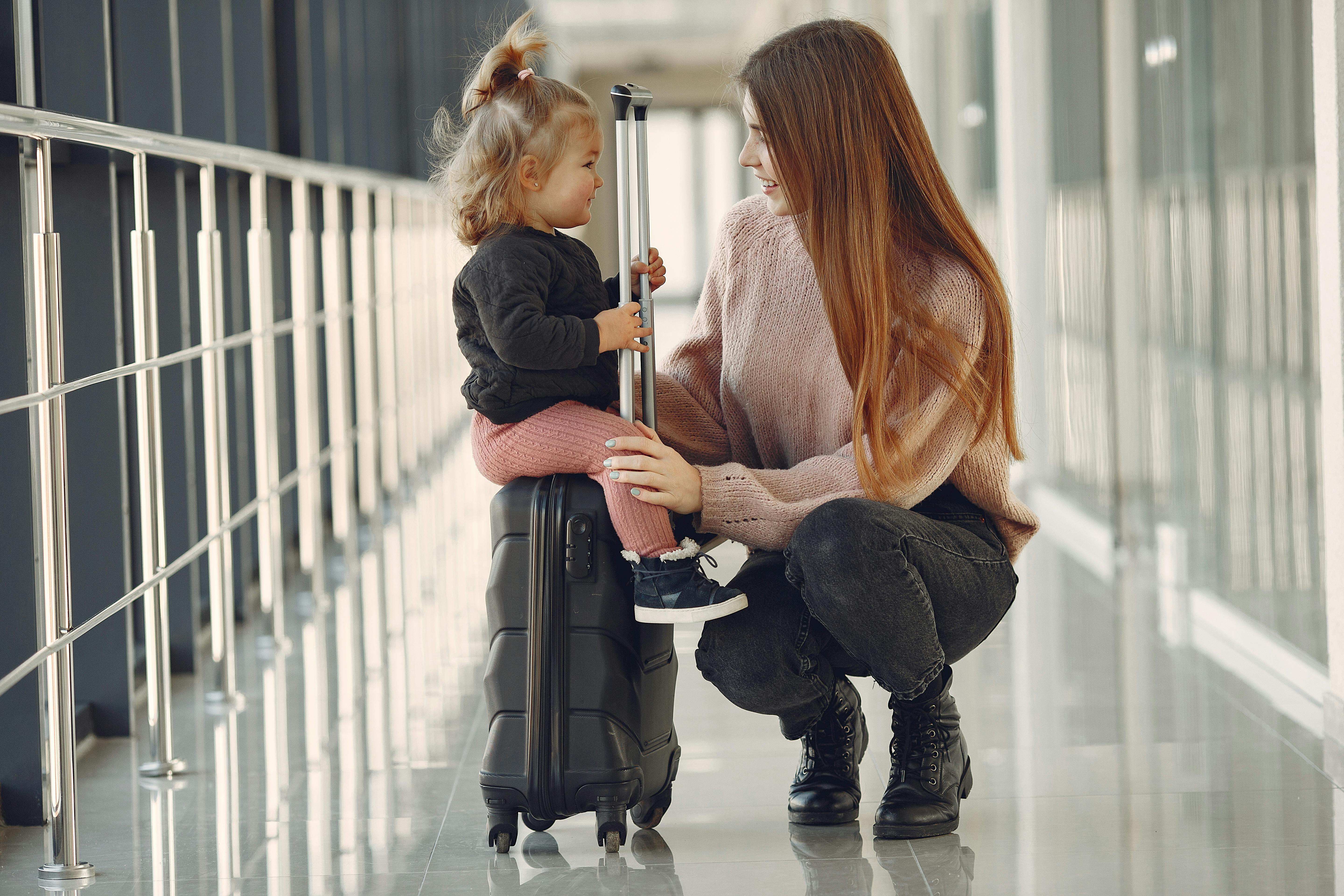 Families travelling calmly through the airport
