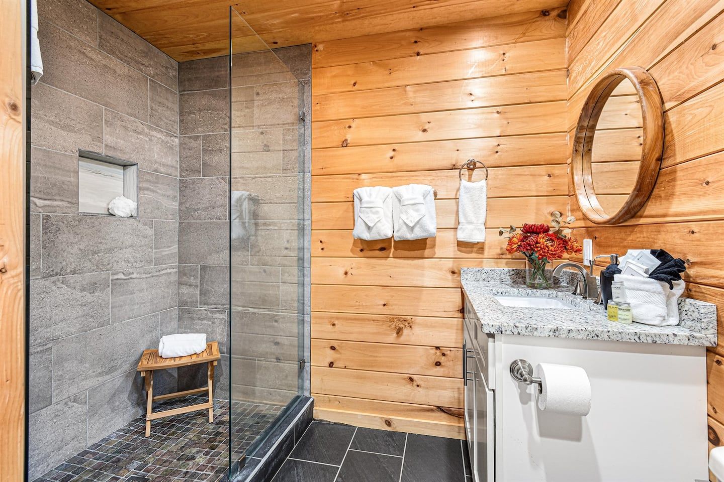 Unwind from a day in the mountains with a refreshing escape in the spacious walk-in shower. Let water cascade over you, washing away the day’s dust and rejuvenating your spirit. End the day with comfort, luxury, and peace in your private oasis.