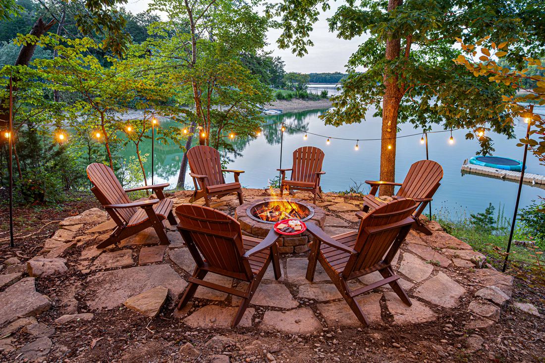 Fire pit dinner under the string lights