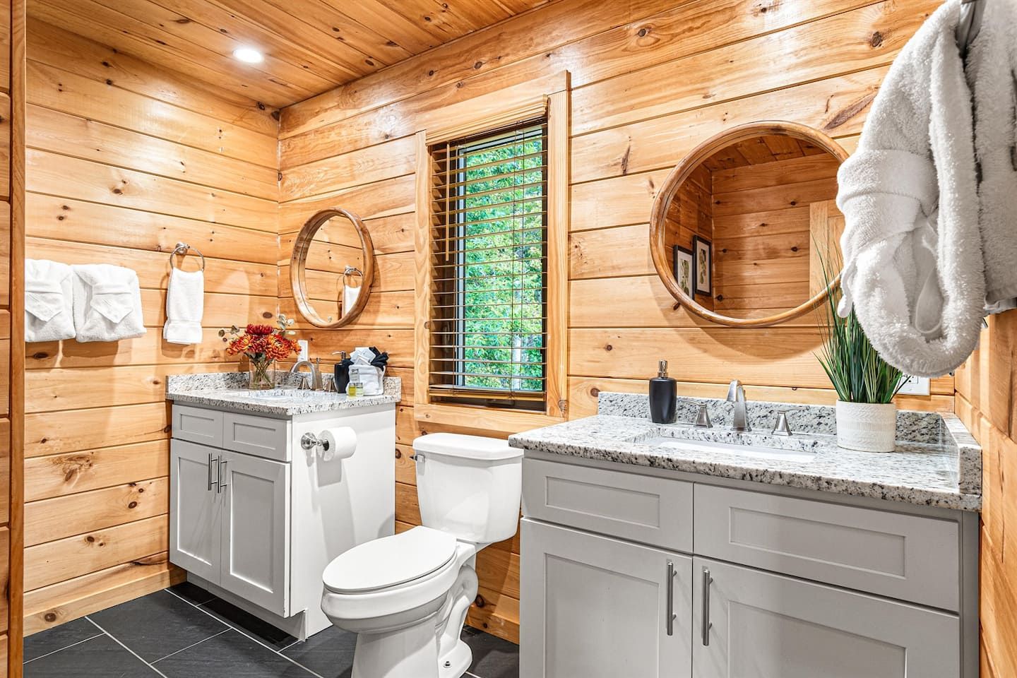 The Master Jack and Jill ensuite bathroom offers a convenient space, offering functionality and simplicity to your daily routine. Enjoy a harmonious atmosphere that prioritizes comfort and ease, making it the perfect retreat after a long day.