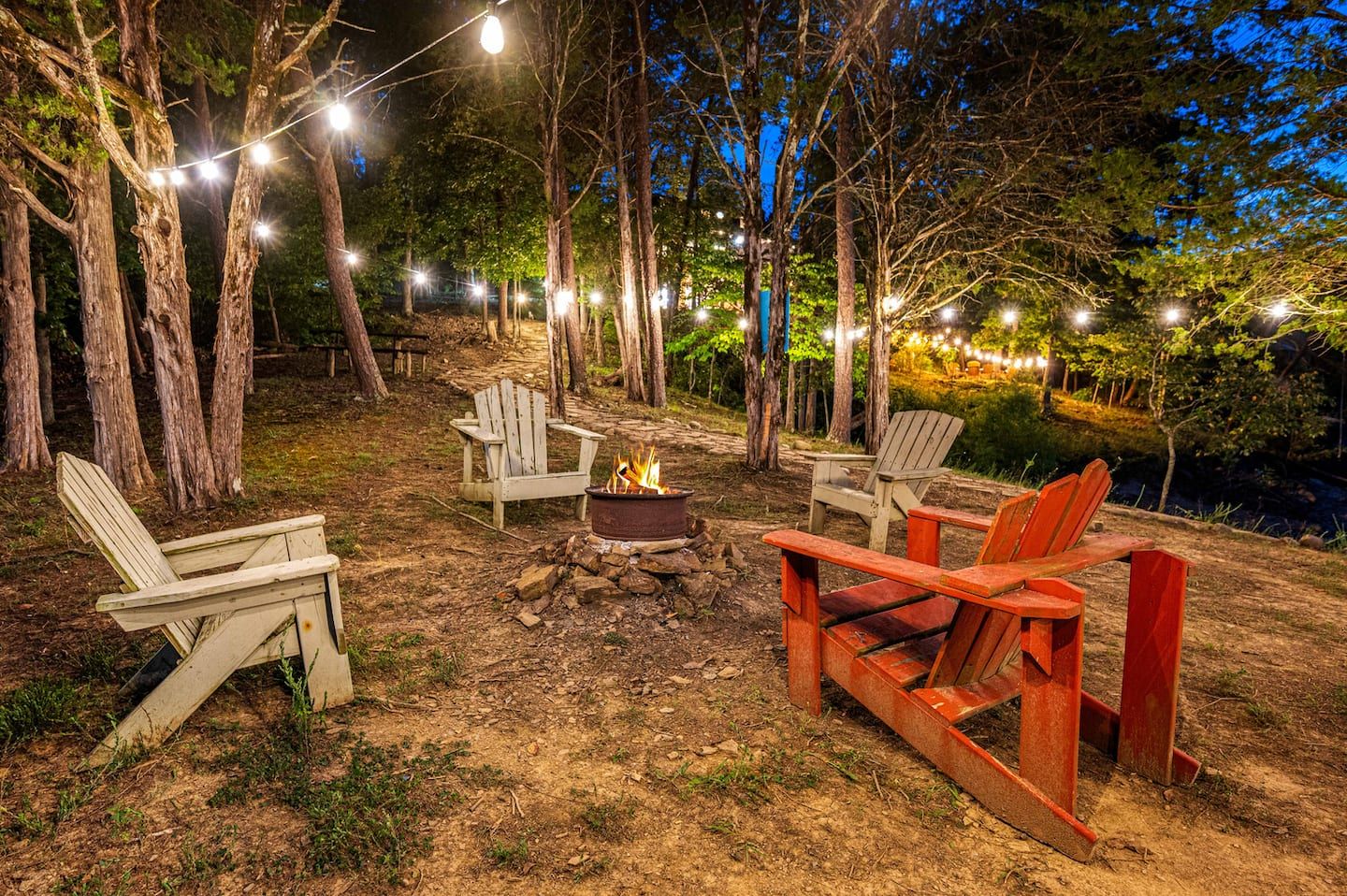 When the string lights come on over the fire pit, the day is not over. It is just getting good.