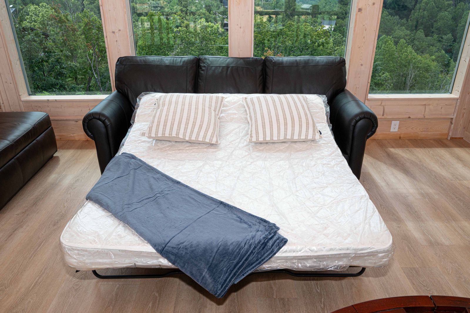 Loft sleeper sofa made up for guests