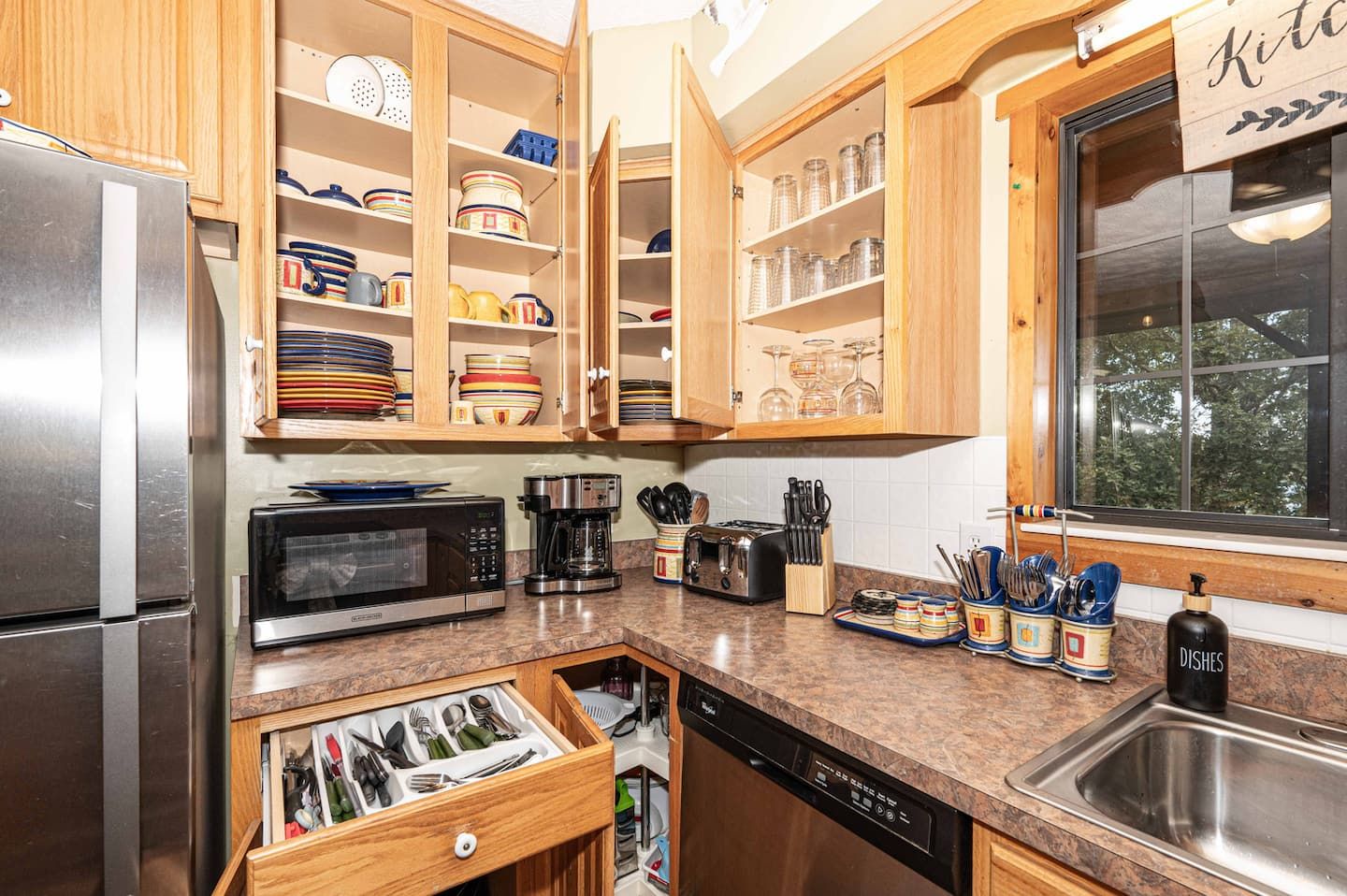 The kitchen comes fully loaded with cookware, small appliances, and all the basics.
