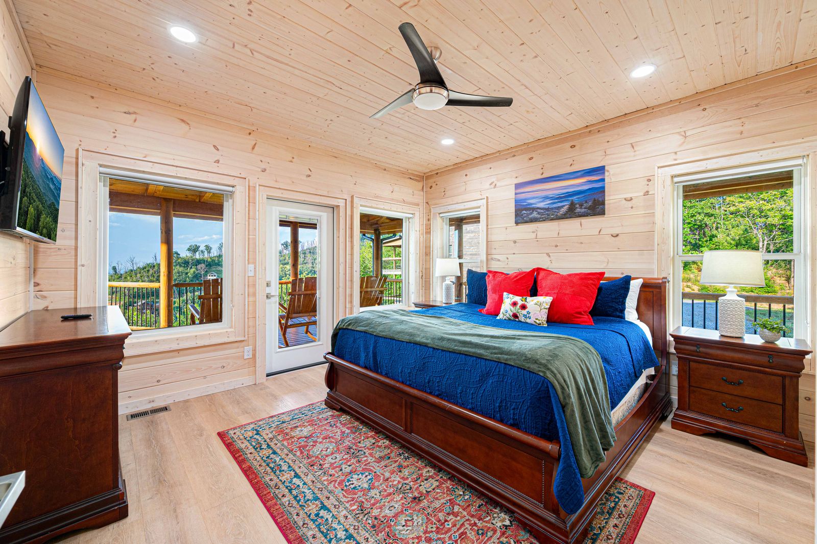 Main-level king suite with deck access
