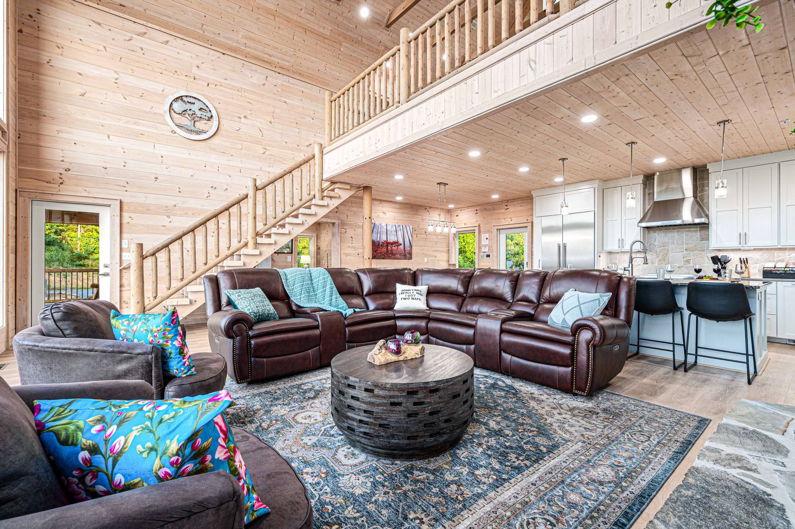 Great room seating beneath the loft
