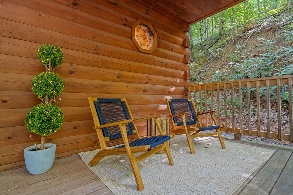 Two chairs on the covered front porch