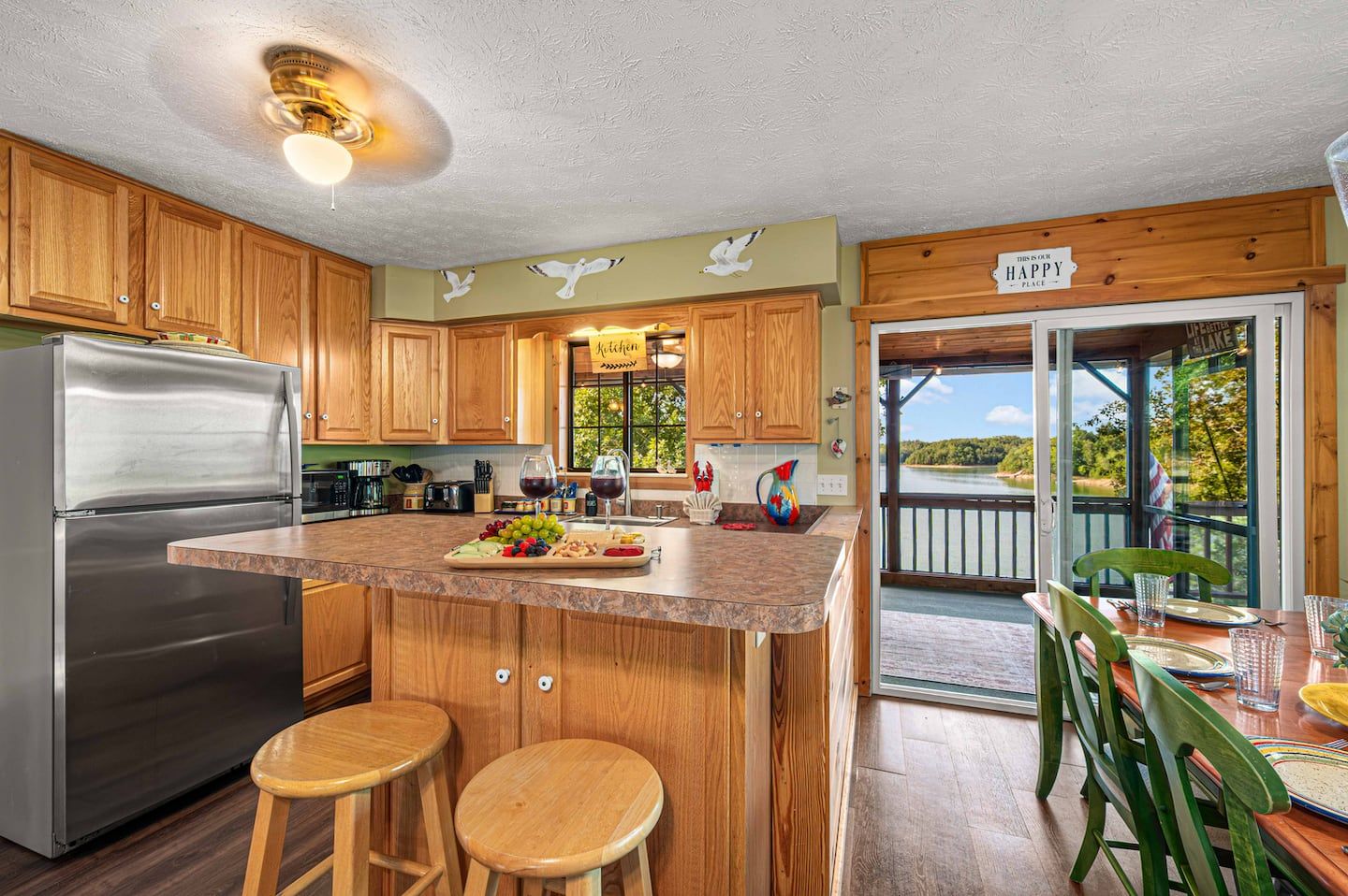 A fully equipped kitchen with a Douglas Lake view. Cook for the whole crew without missing anything happening out on the water.