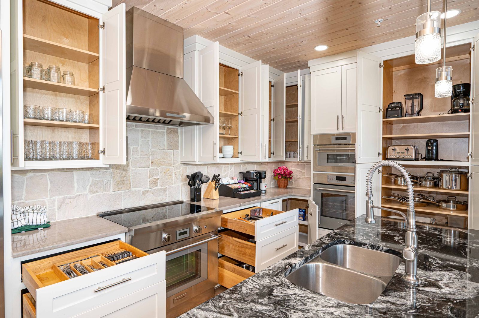 Stocked kitchen cabinets and drawers