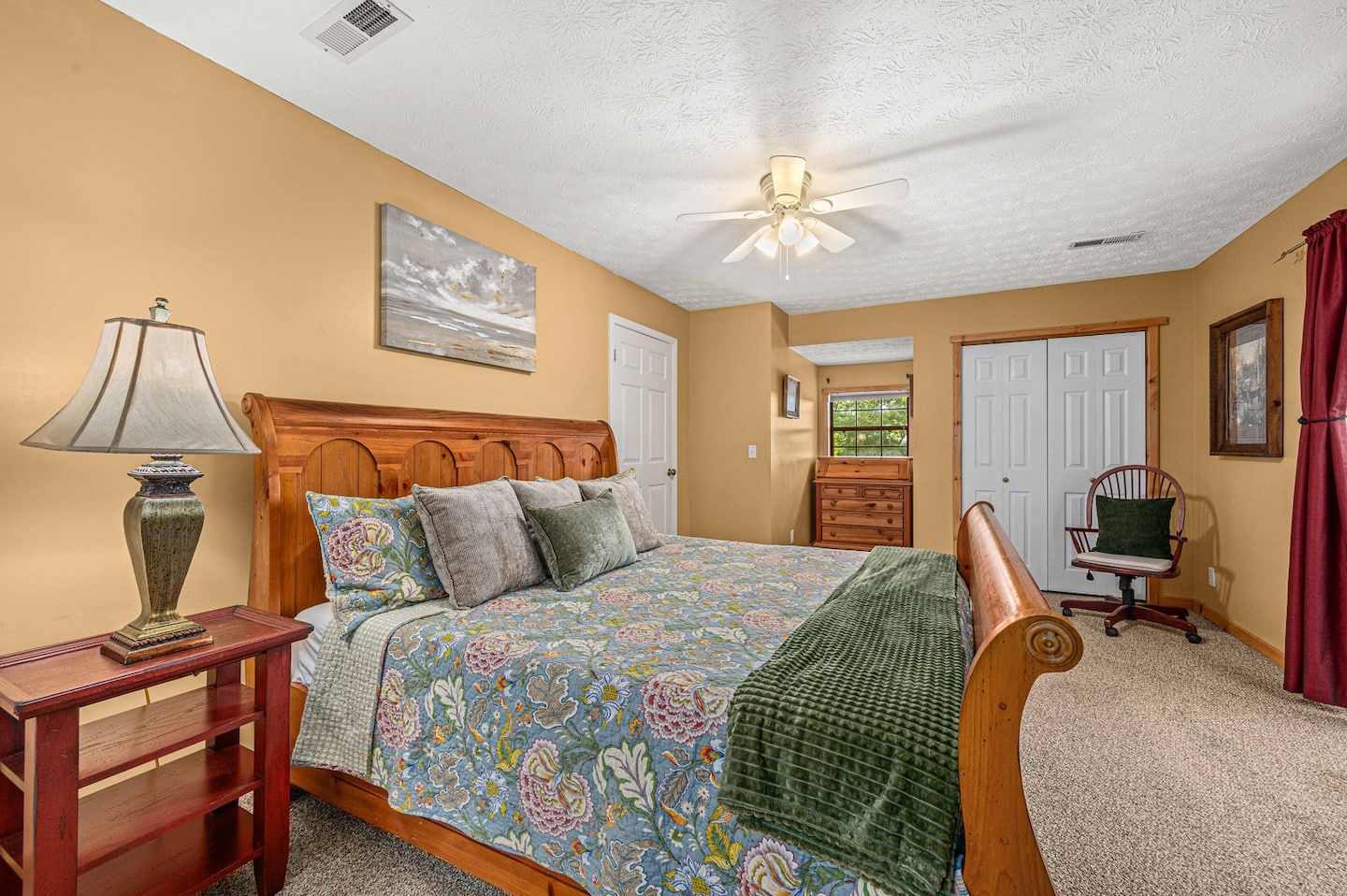 The upstairs king bedroom, quiet and set back from the main living space.