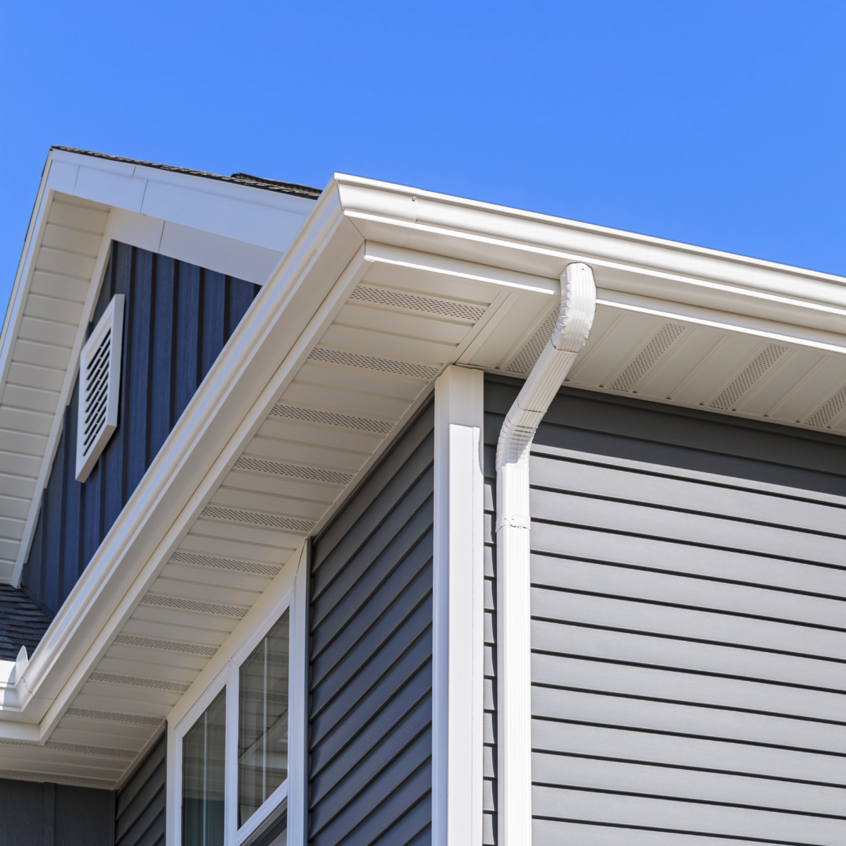 Gutter and downspout on house
