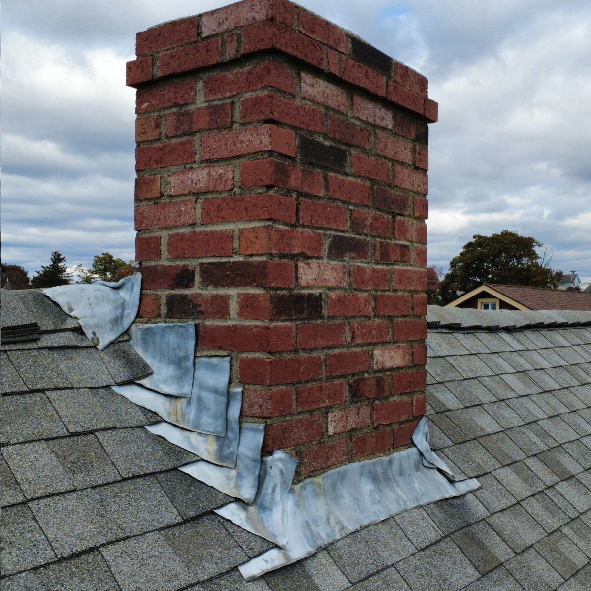 chimney flashing and roof repair on an Everett home